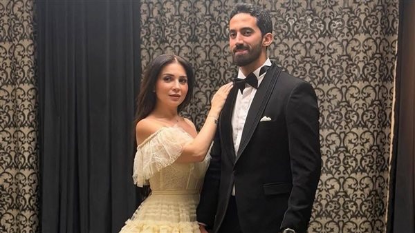 مي عز الدين وزوجها