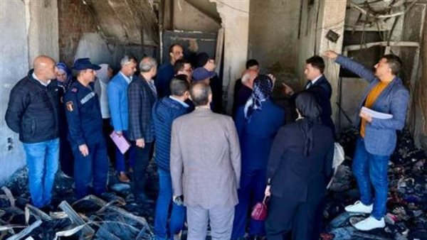 حريق عقار بسوق تجاري