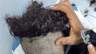 مشجع أرجنتيني بعد حلق رأسه    