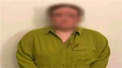 المتهمة بعد ضبطها    