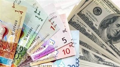 الدولار والدينار الكويتي     