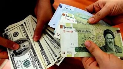 الريال الإيراني والدولار    
